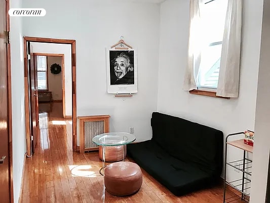 sitting room featuring light wood-type flooring