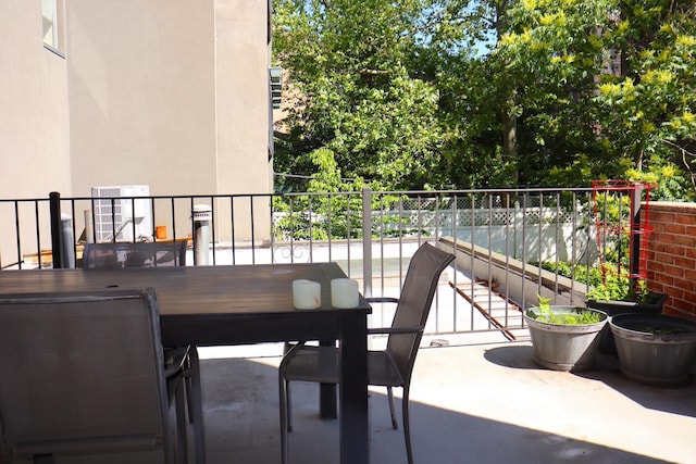 balcony featuring outdoor dining space