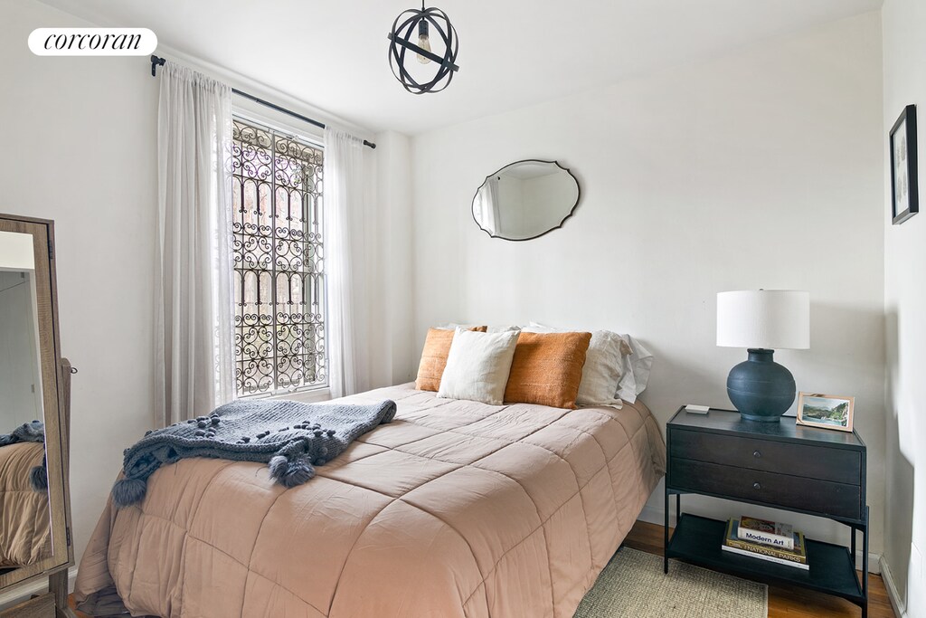 bedroom featuring light wood-type flooring