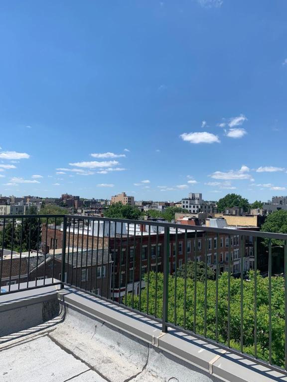 balcony featuring a view of city