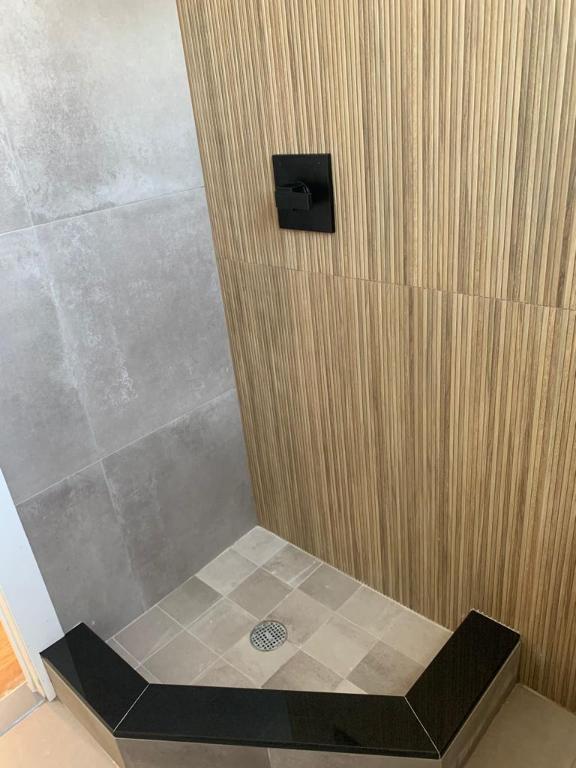 interior space with a tile shower