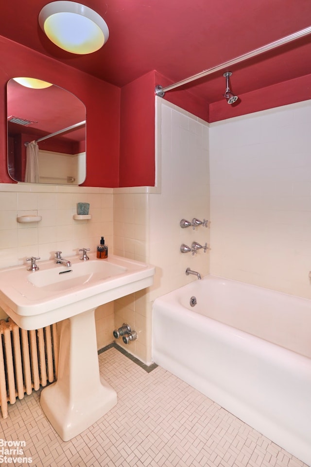 full bath featuring shower / bath combo