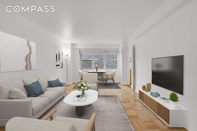 living room featuring light parquet flooring