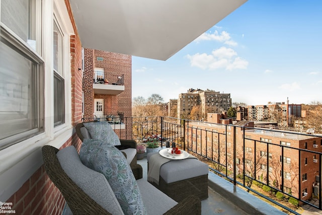 balcony featuring a city view