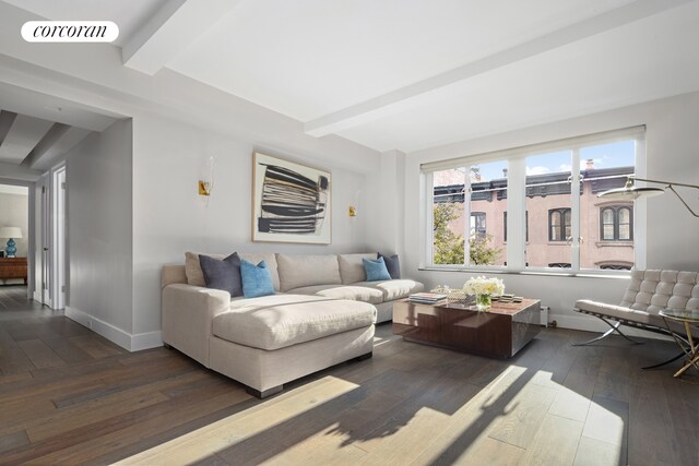 bedroom featuring a notable chandelier, dark hardwood / wood-style flooring, and beamed ceiling