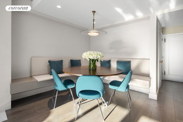 dining area featuring breakfast area and dark hardwood / wood-style floors