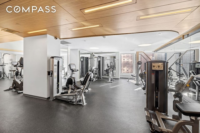 gym with wood ceiling