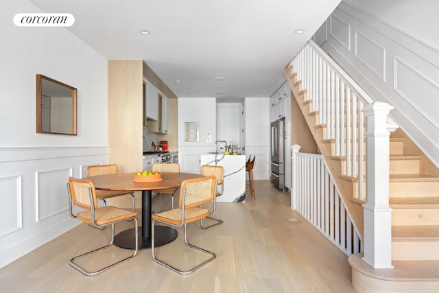 dining room featuring light hardwood / wood-style floors