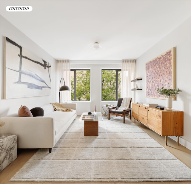 living room with light hardwood / wood-style floors