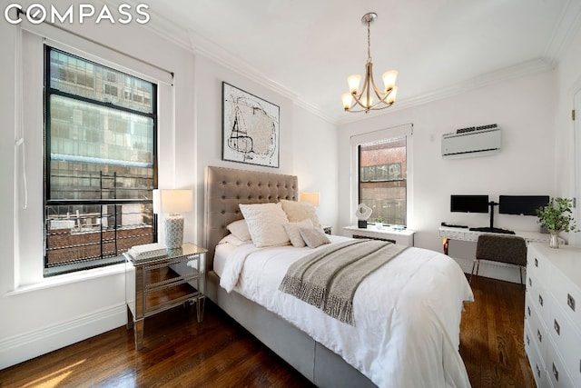 bedroom featuring a notable chandelier, dark hardwood / wood-style flooring, crown molding, and a wall mounted air conditioner