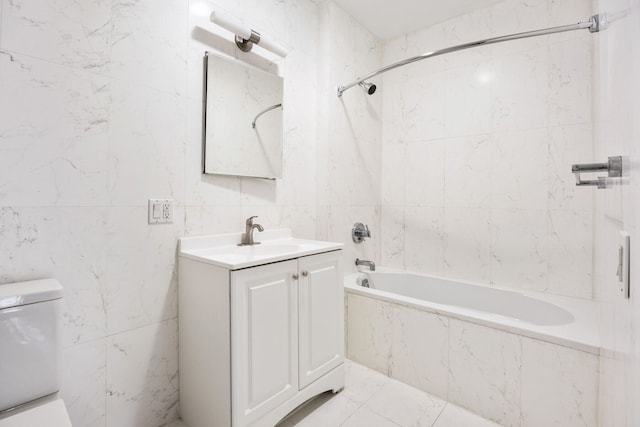 305 W 150th St Unit 505, New York City, NY 10039 - full bath featuring tile walls, vanity, a combined bath / shower with marble appearance, and toilet