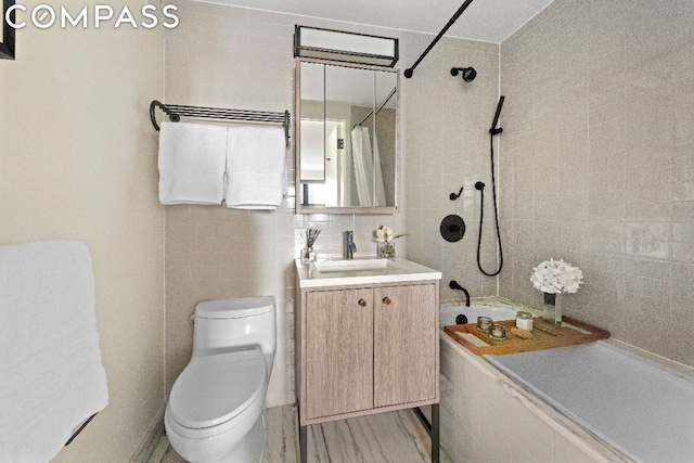 full bathroom featuring toilet, vanity, tile walls, shower / bath combo, and decorative backsplash