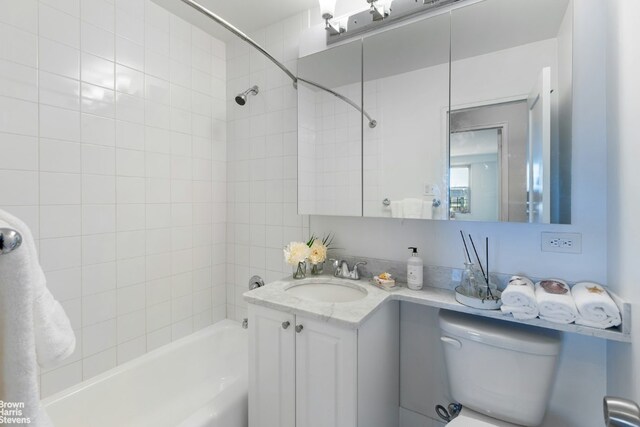 kitchen with white cabinetry, appliances with stainless steel finishes, backsplash, light wood-type flooring, and sink