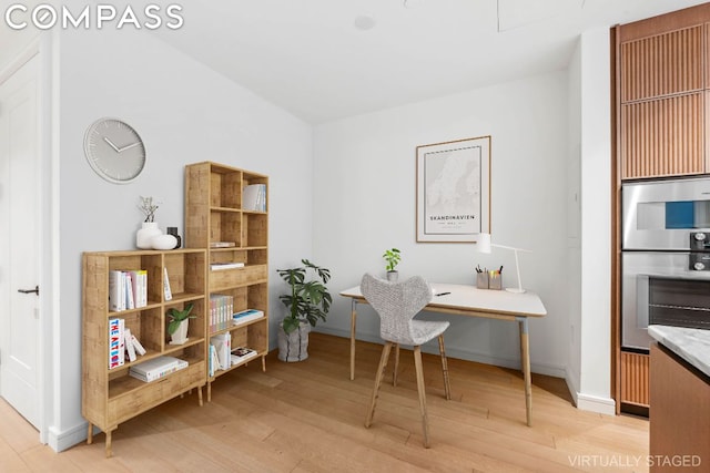 home office featuring light hardwood / wood-style flooring