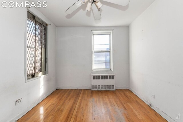 empty room featuring hardwood / wood-style floors