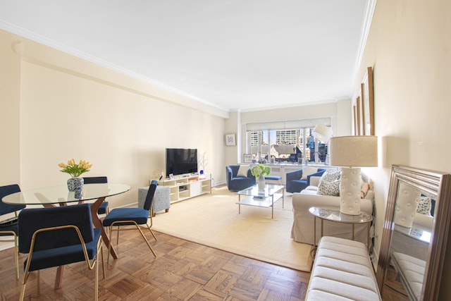 living room with parquet flooring and ornamental molding