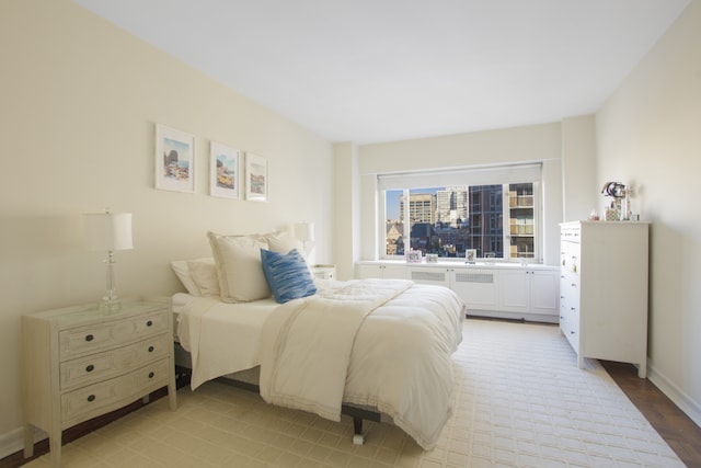 bedroom featuring baseboards