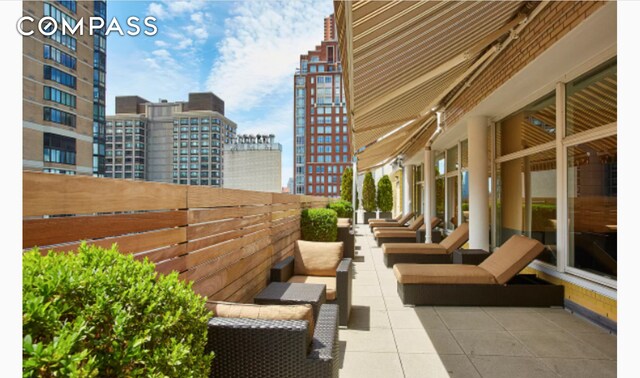 200 E 66th St Unit D1203, New York City, NY 10065 - view of patio with a view of city
