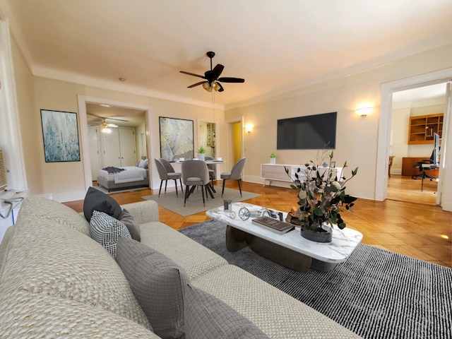 living area featuring a ceiling fan