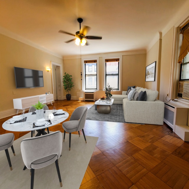 dining space with ceiling fan, ornamental molding, and parquet floors