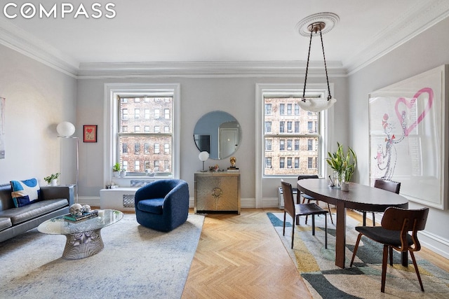 living room with light parquet floors and ornamental molding