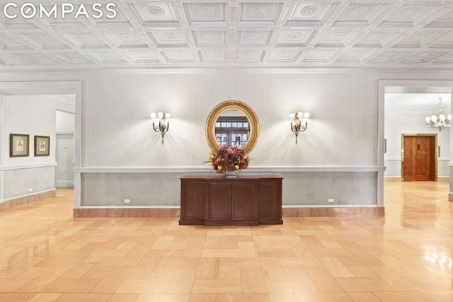 interior space featuring an inviting chandelier and light parquet floors