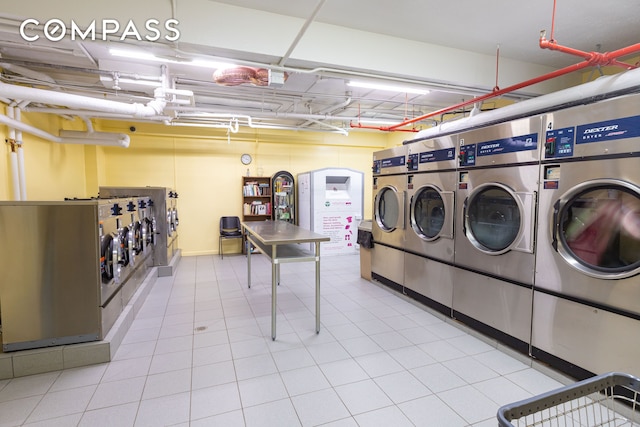99-21 67th Rd Unit 7A, New York City, NY 11375 - shared laundry room featuring washer and dryer and tile patterned floors