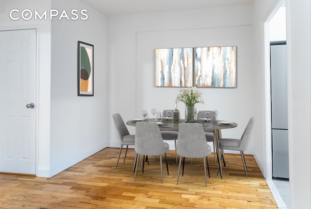 99-21 67th Rd Unit 7A, New York City, NY 11375 - dining area with wood finished floors and baseboards