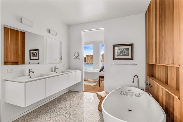 bathroom with toilet and vanity