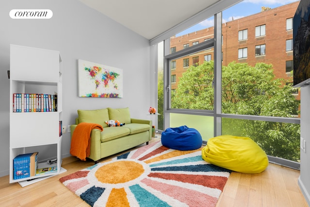 425 W 53rd St Unit 409, New York City, NY 10019 - living area featuring wood finished floors