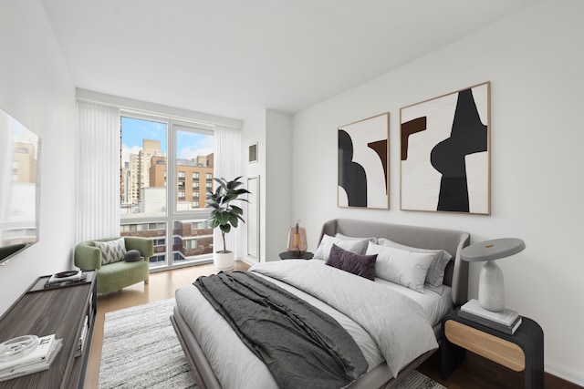 bedroom with wood finished floors