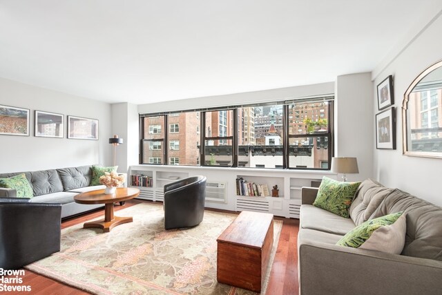 living room with hardwood / wood-style flooring