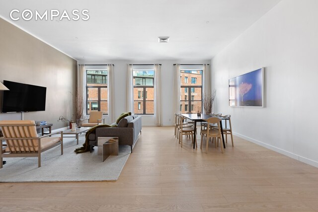 bedroom with light hardwood / wood-style floors