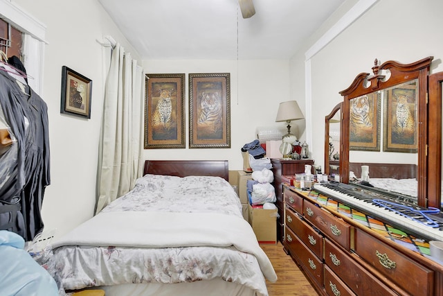 bedroom with light wood-style floors