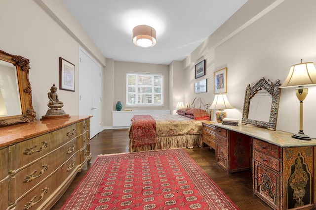 bedroom featuring dark wood-type flooring