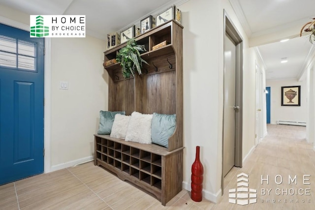 mudroom featuring baseboard heating and crown molding