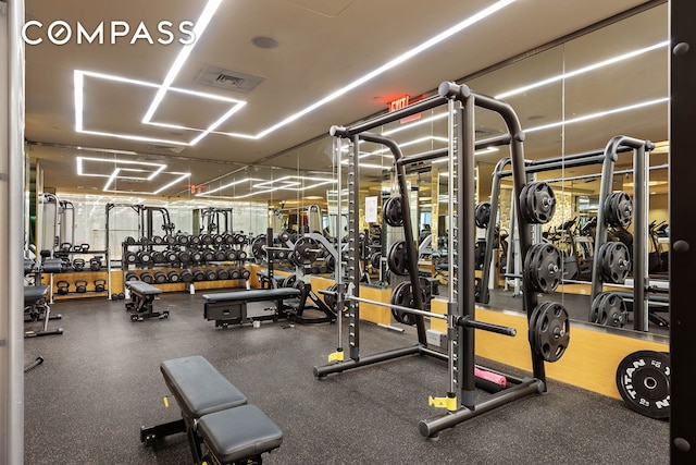 exercise room featuring visible vents