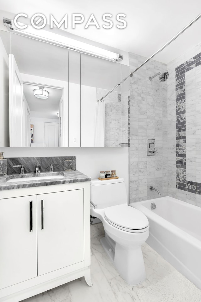 full bath featuring toilet, marble finish flooring, shower / bath combination with curtain, and vanity