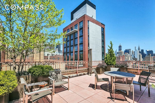 view of patio with a view of city