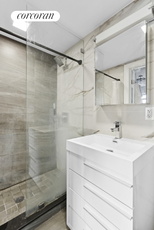 bathroom with vanity and a shower with curtain