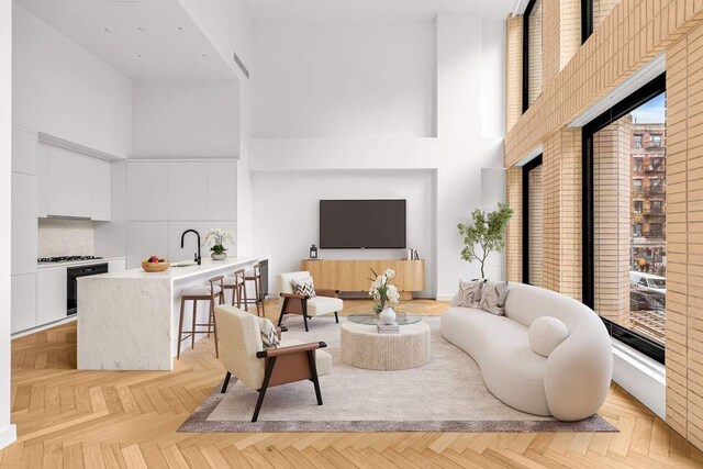 living room with a high ceiling