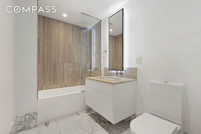 429 Kent Ave Unit Th2, New York City, NY 11249 - full bath featuring vanity, washtub / shower combination, marble look tile flooring, toilet, and recessed lighting