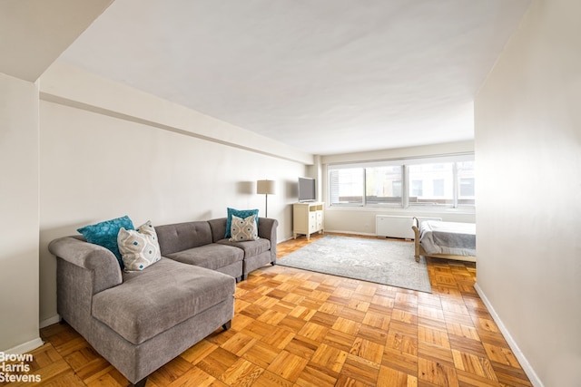 living room with light parquet floors