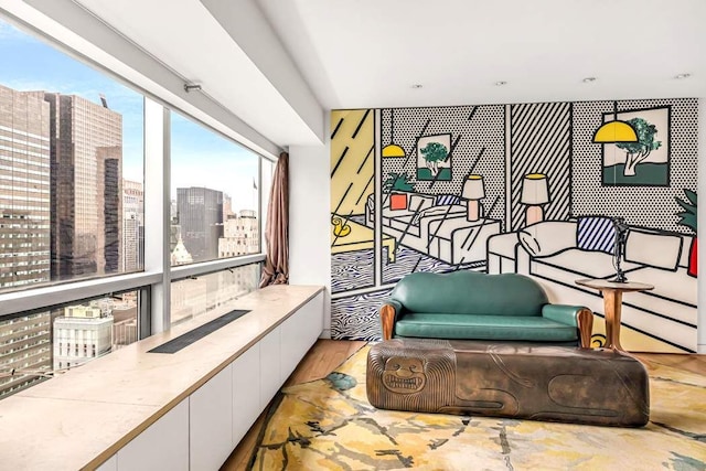 sitting room featuring a view of city