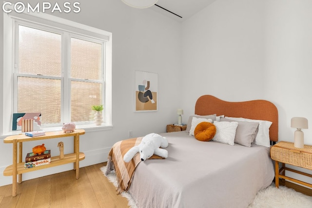 bedroom featuring light wood-type flooring