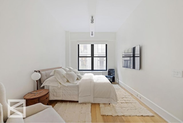 bedroom featuring light hardwood / wood-style floors