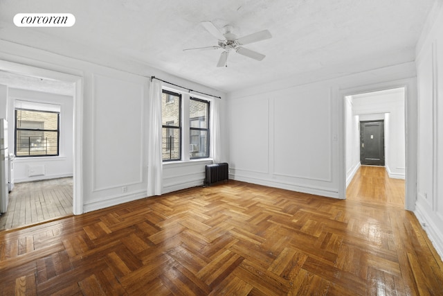 bedroom with hardwood / wood-style flooring and a textured ceiling