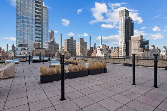 view of patio / terrace with a city view