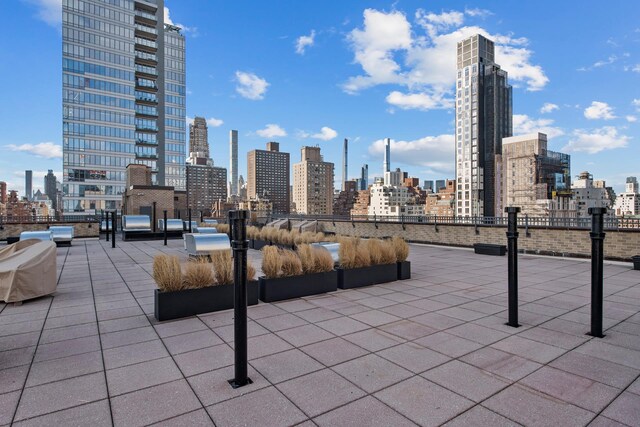 240 E 76th St Unit 14M, New York City, NY 10021 - view of patio / terrace with a city view