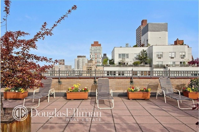 240 E 76th St Unit 14M, New York City, NY 10021 - view of patio / terrace with a city view